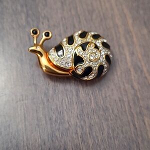 Vintage Black and enamel snail pin